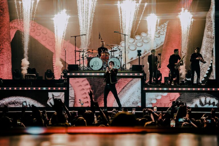 Panic! At the Disco on stage, choreography by Dani Vitale.